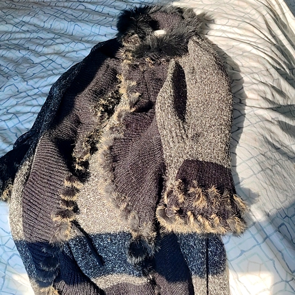 Amazing full length sweater with real fur trim all around